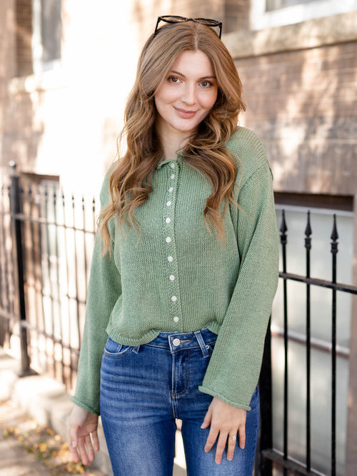 light green button front sweater