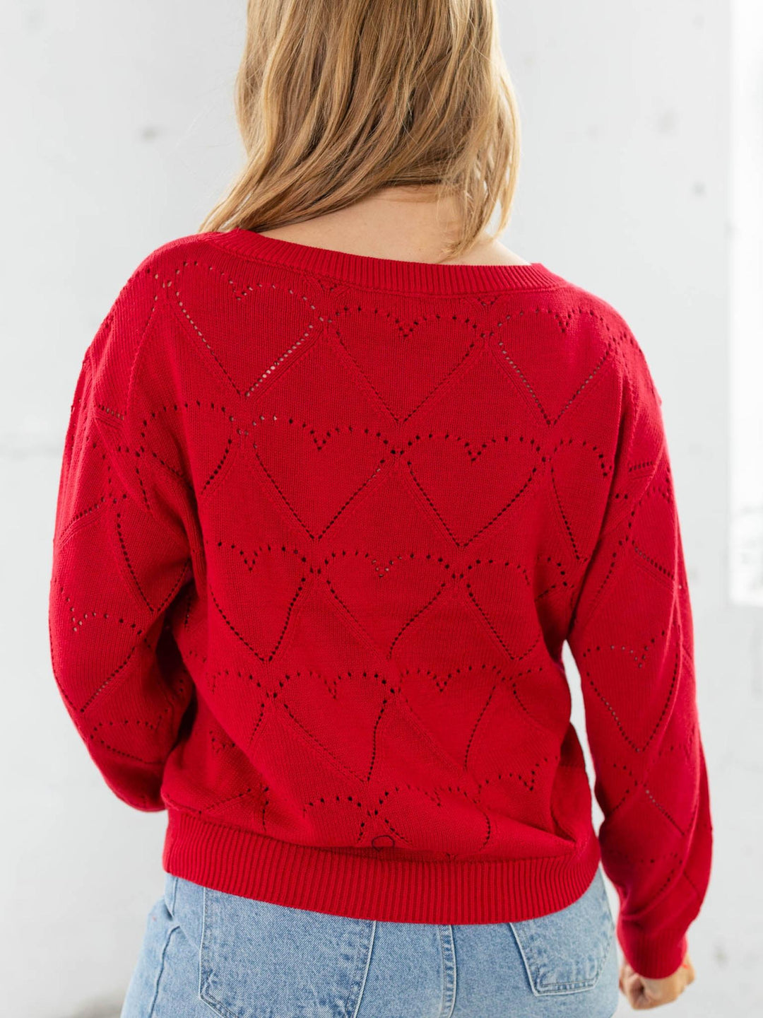 red heart shaped textured sweater