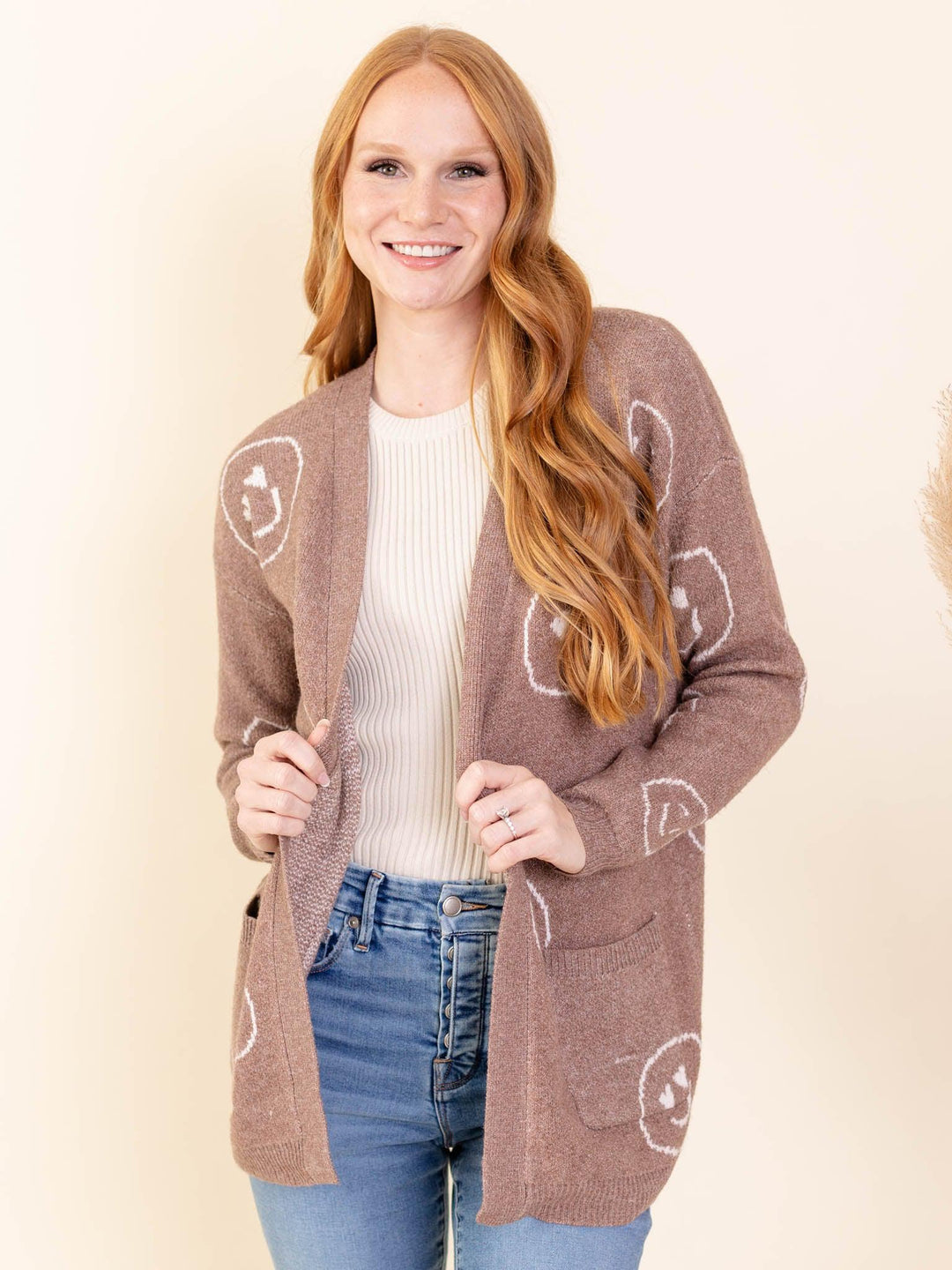 smiley face cardigan