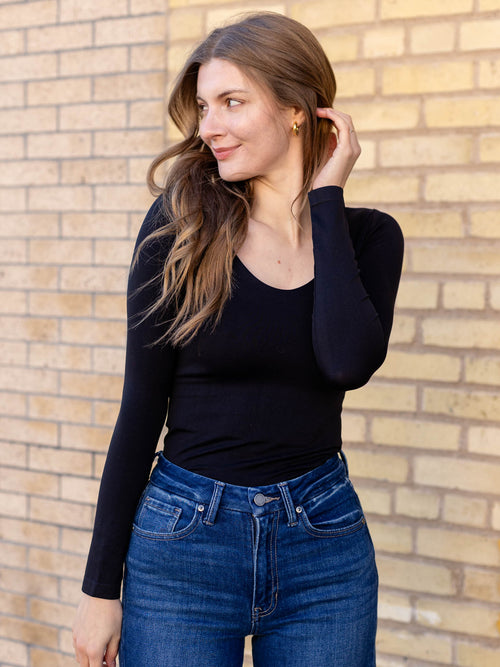 black fitted long sleeve top