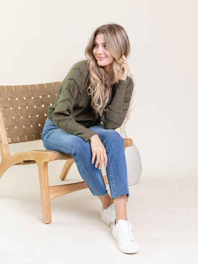 green sweater