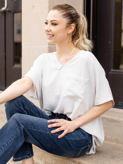 pocket front woven top