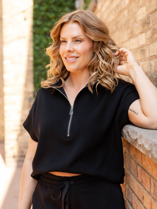 black half zip short sleeve sweatshirt