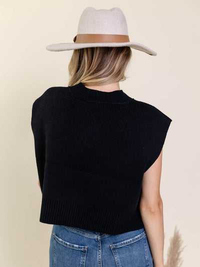 black sleeveless sweater knit top