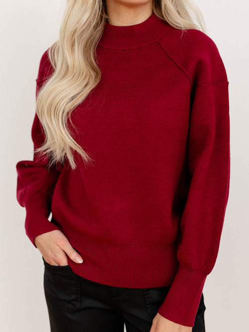 exposed seam mock neck raglan sweater