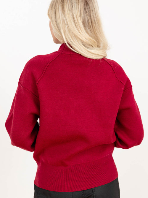 exposed seam mock neck raglan sweater
