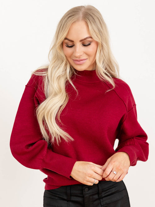 exposed seam mock neck raglan sweater