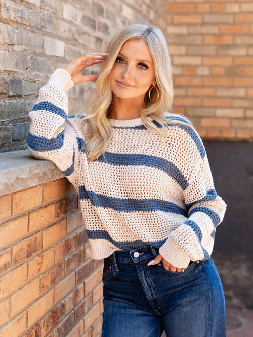 blue and cream open knit sweater