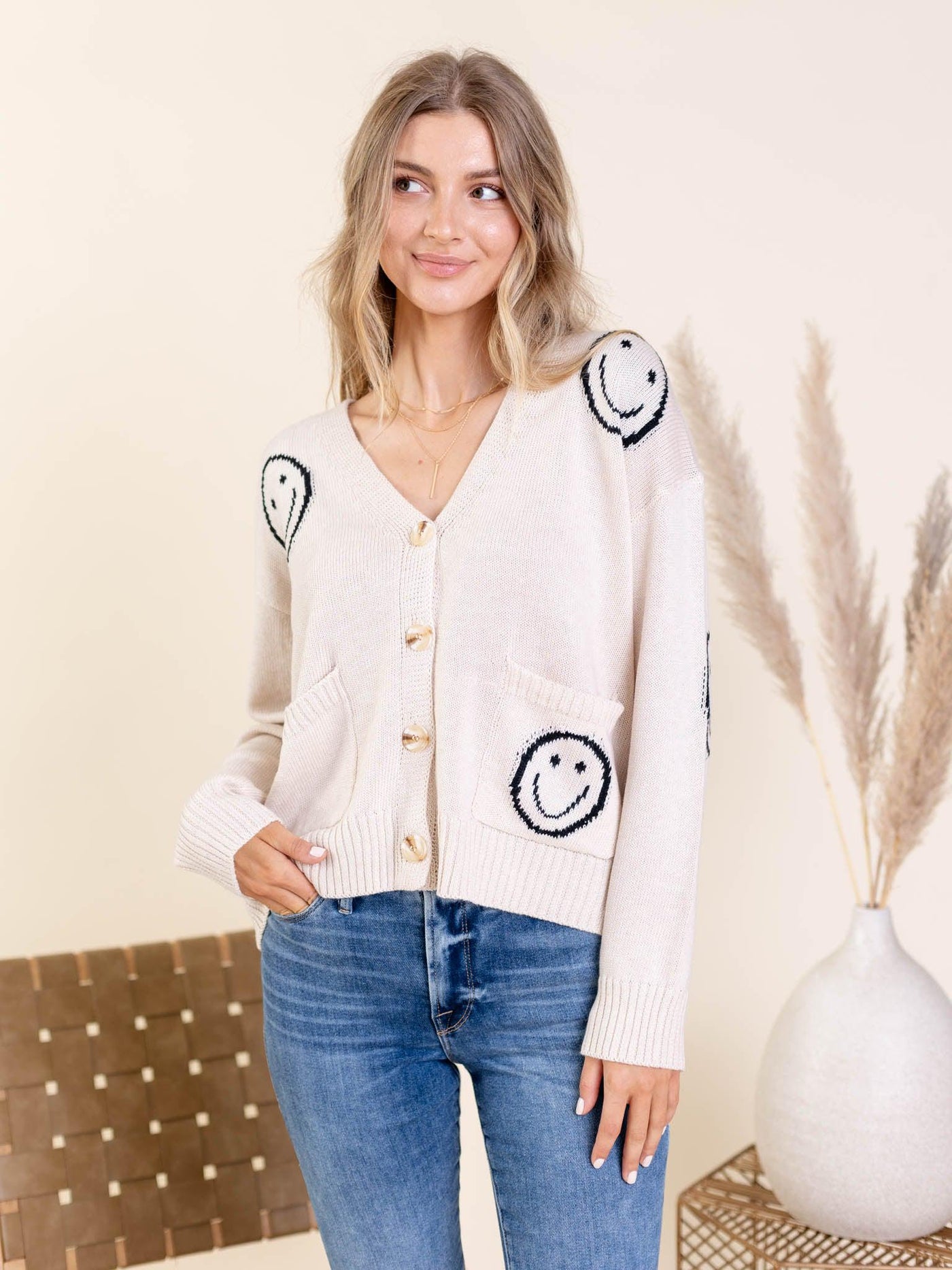 smiley face graphic cardigan