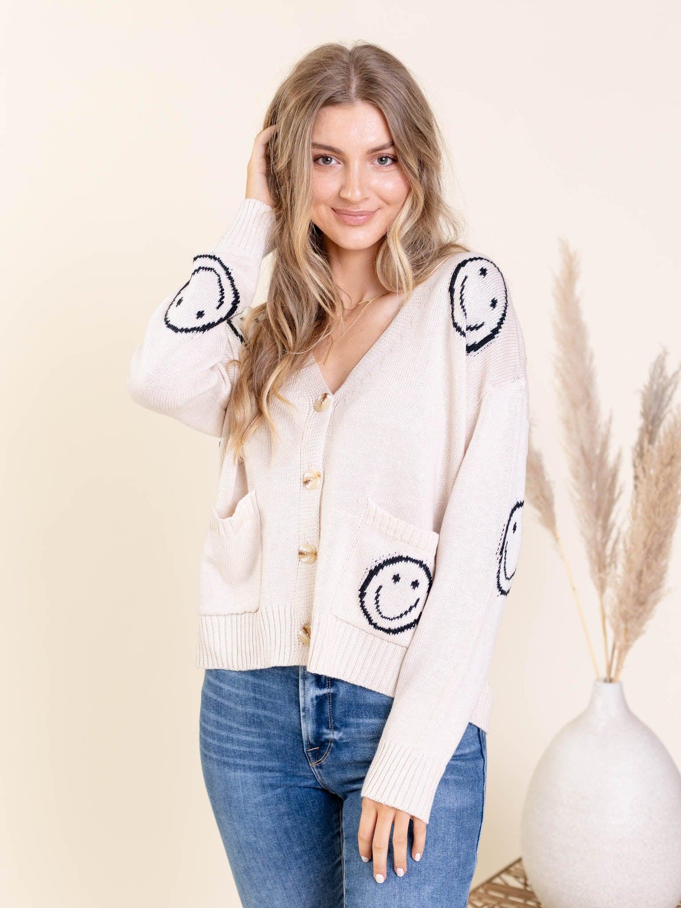 smiley face cardigan