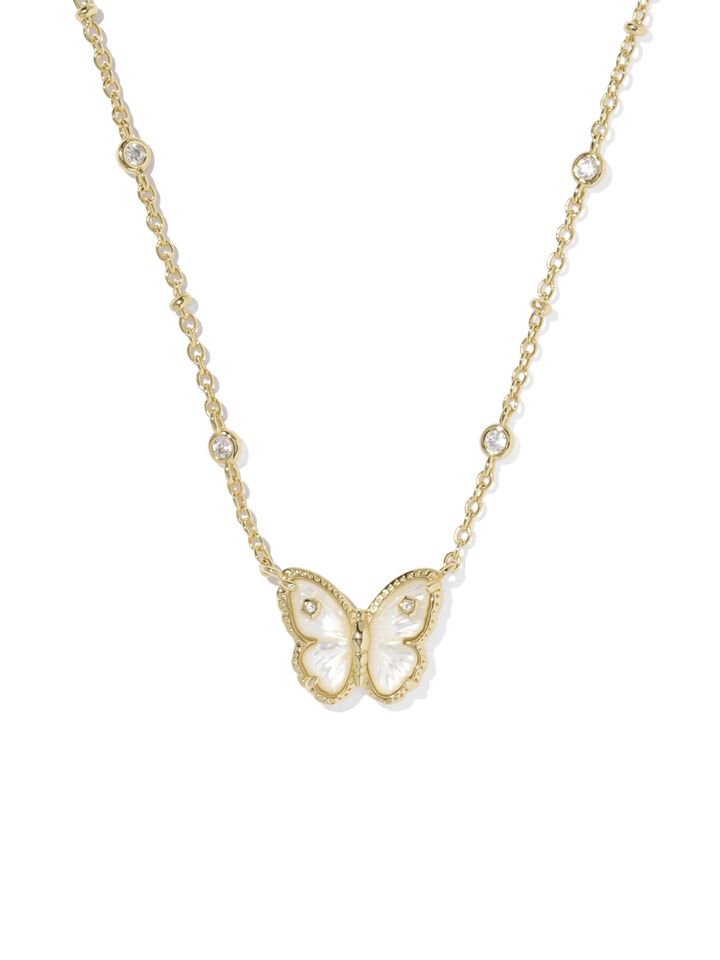 Gold butterfly necklace on a white background
