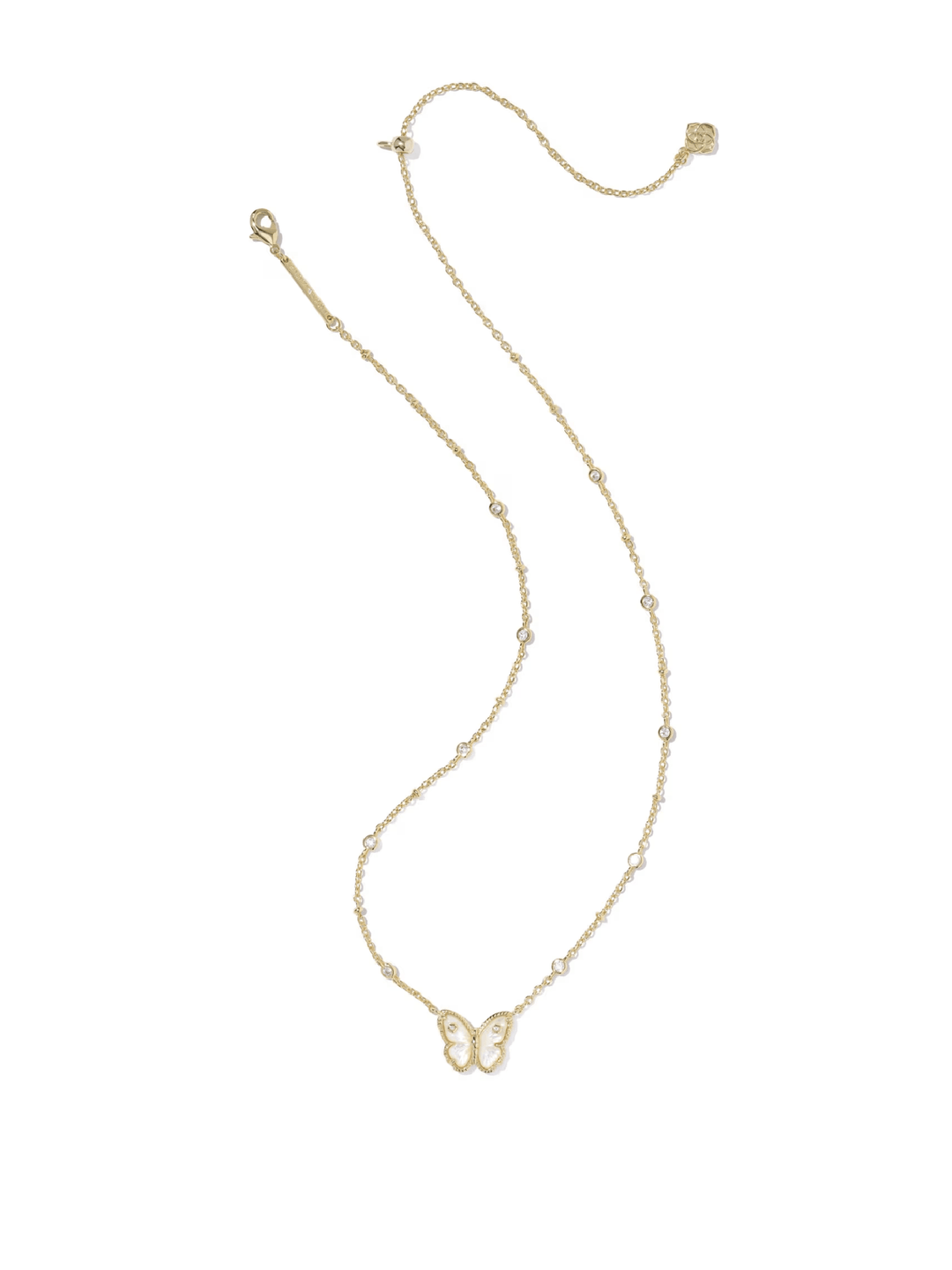 Gold butterfly necklace on a white background