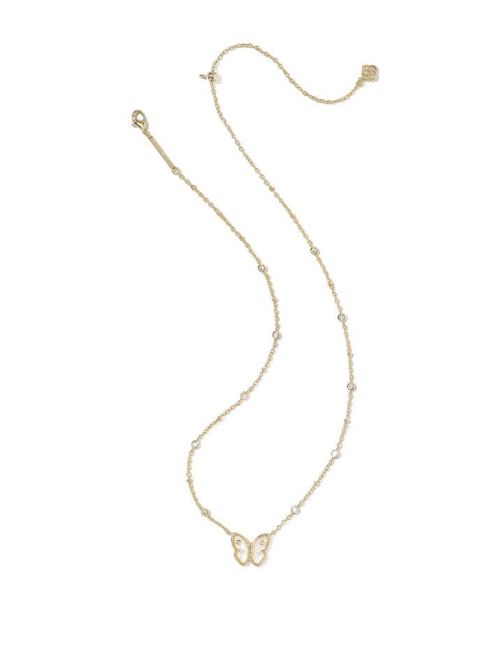 Gold butterfly necklace on a white background