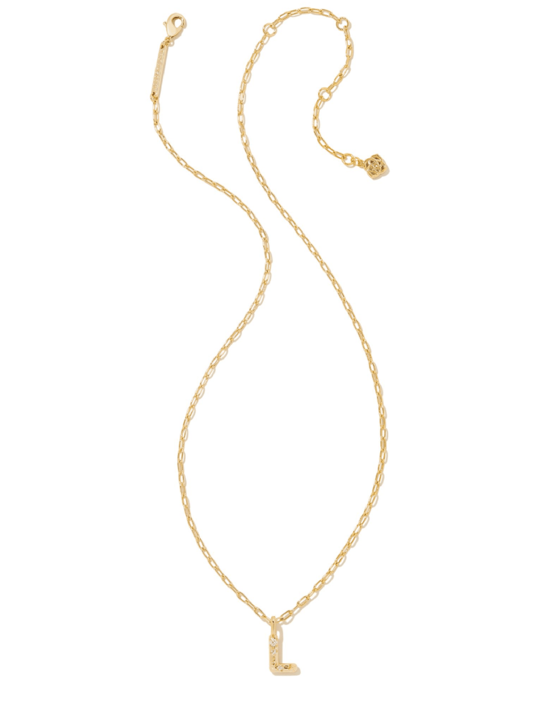 A delicate gold chain necklace featuring a small pendant engraved with the letter &