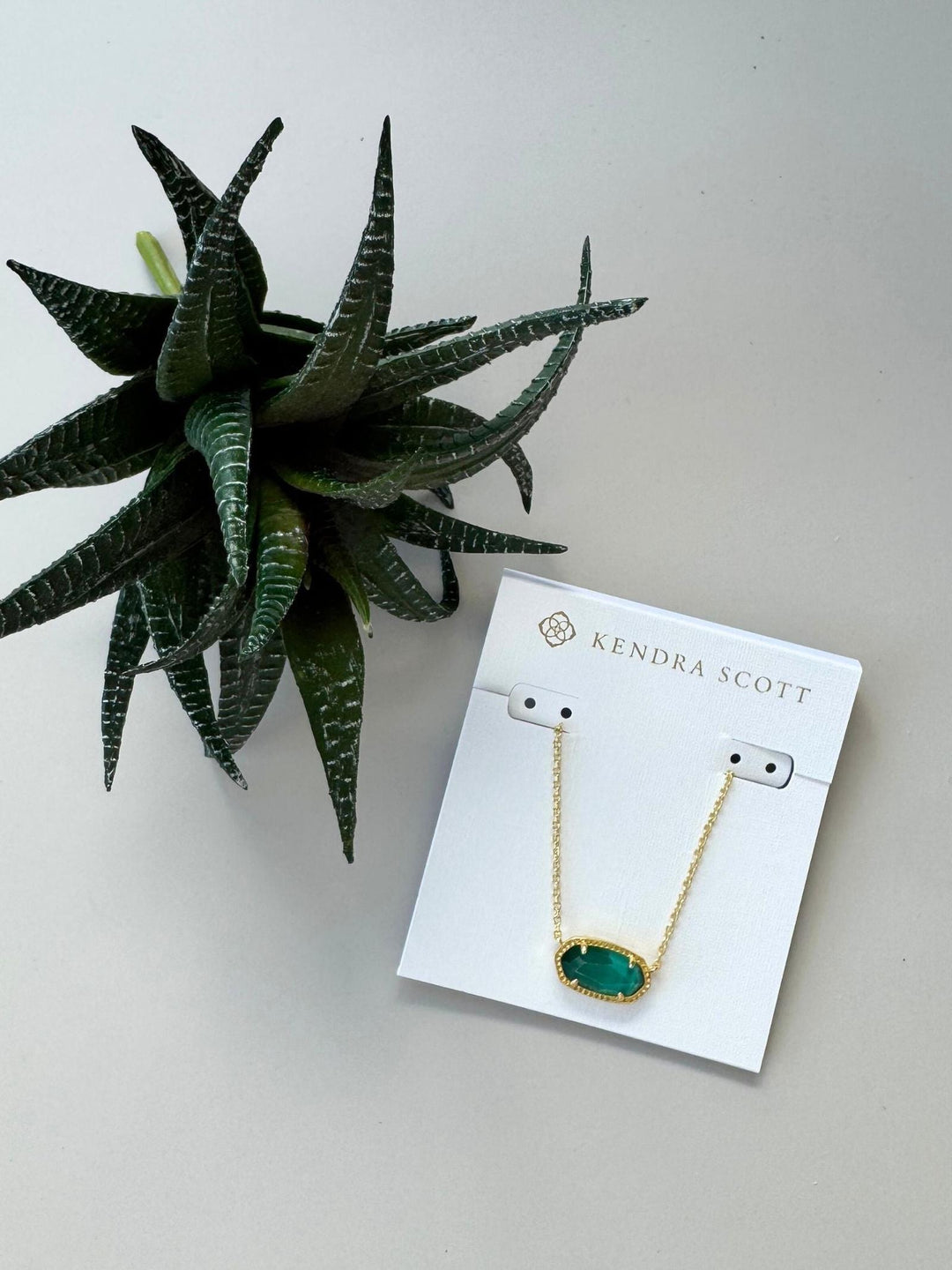 green and gold kendra scott necklace