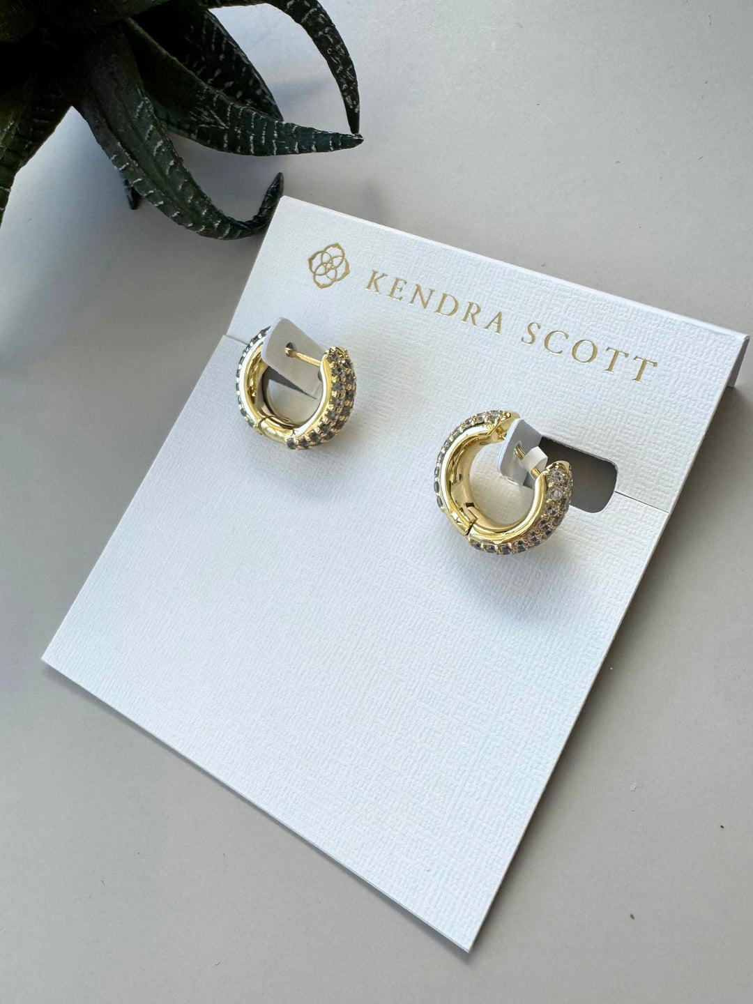 gold pave huggie earrings