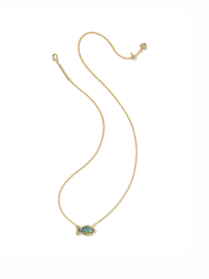 A delicate gold chain necklace featuring a small fish-shaped pendant with a turquoise-blue center stone, displayed on a clean white background.