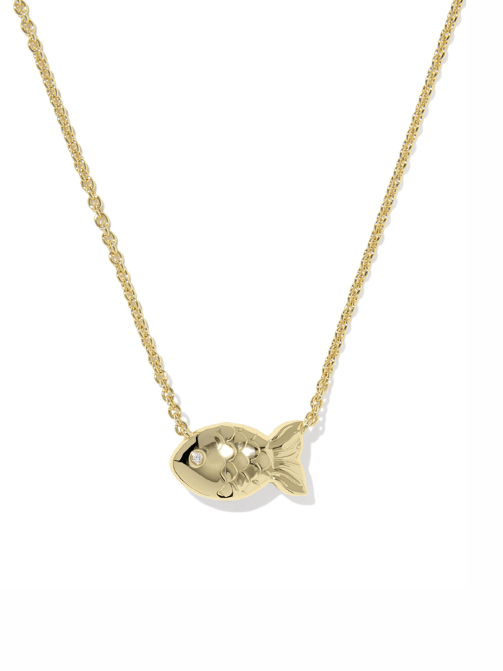 A gold fish pendant necklace on a delicate gold chain, shown against a plain white background.