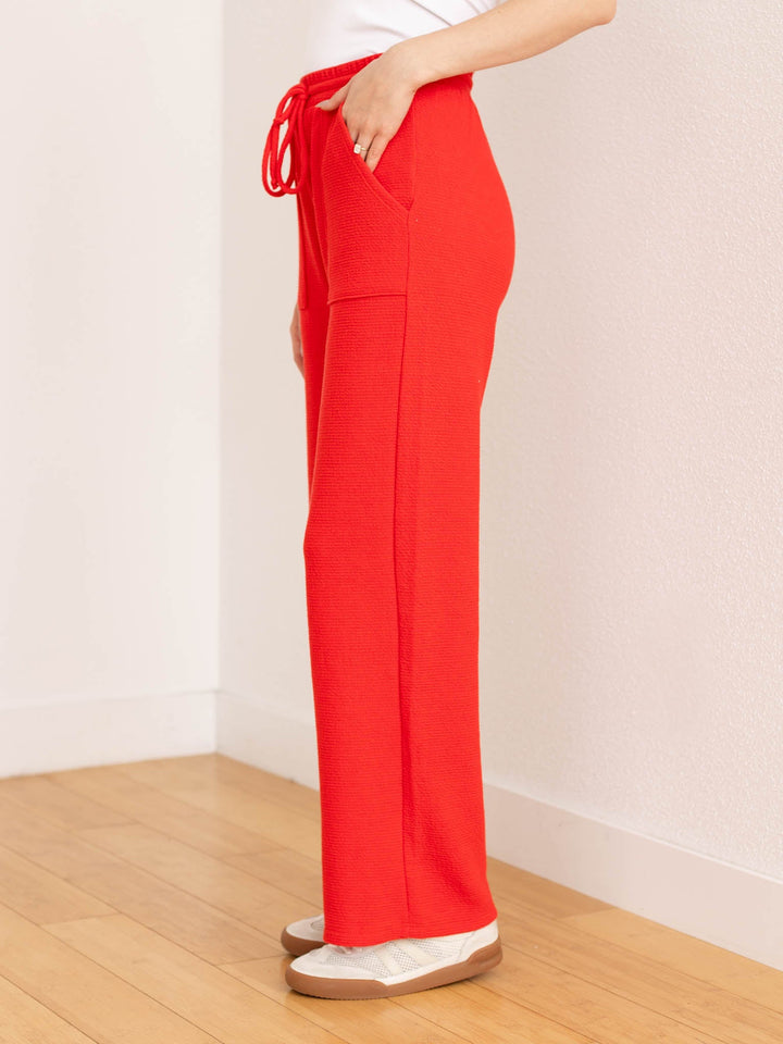 red textured straight leg pant