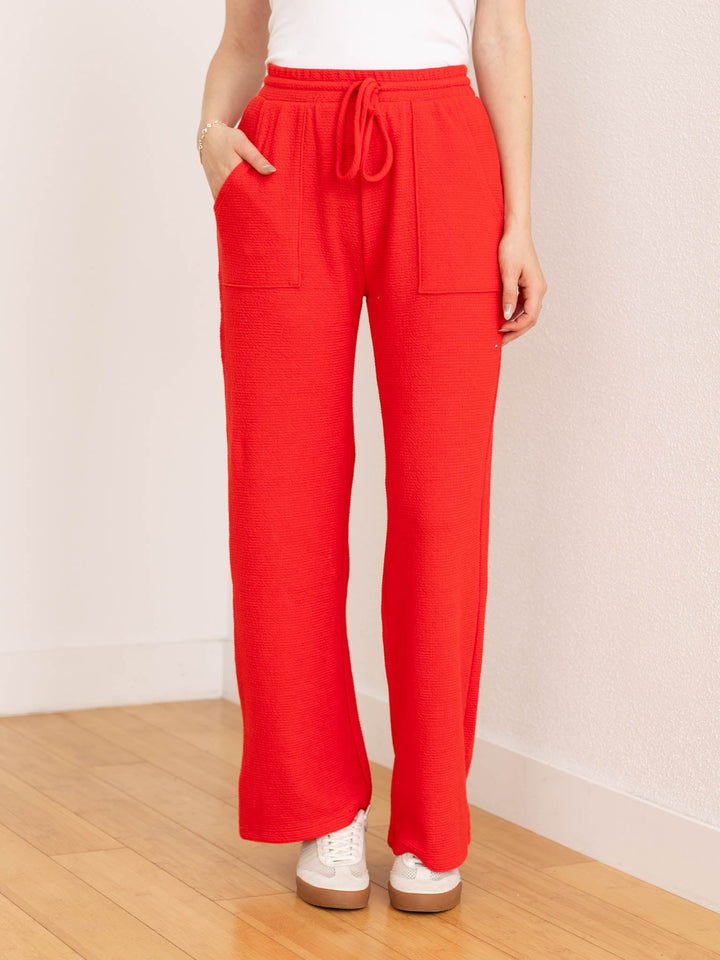 red textured straight leg pant