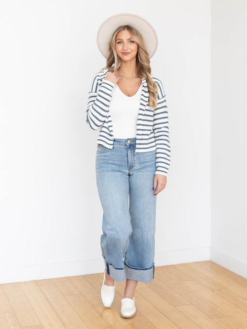 medium wash high rise cuffed wide leg denim