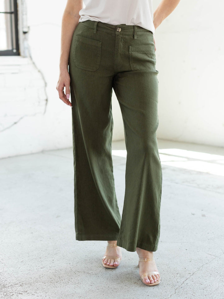 KUT from the Kloth Meg High Rise Wide Leg pants in Forest green linen blend, full-length front view