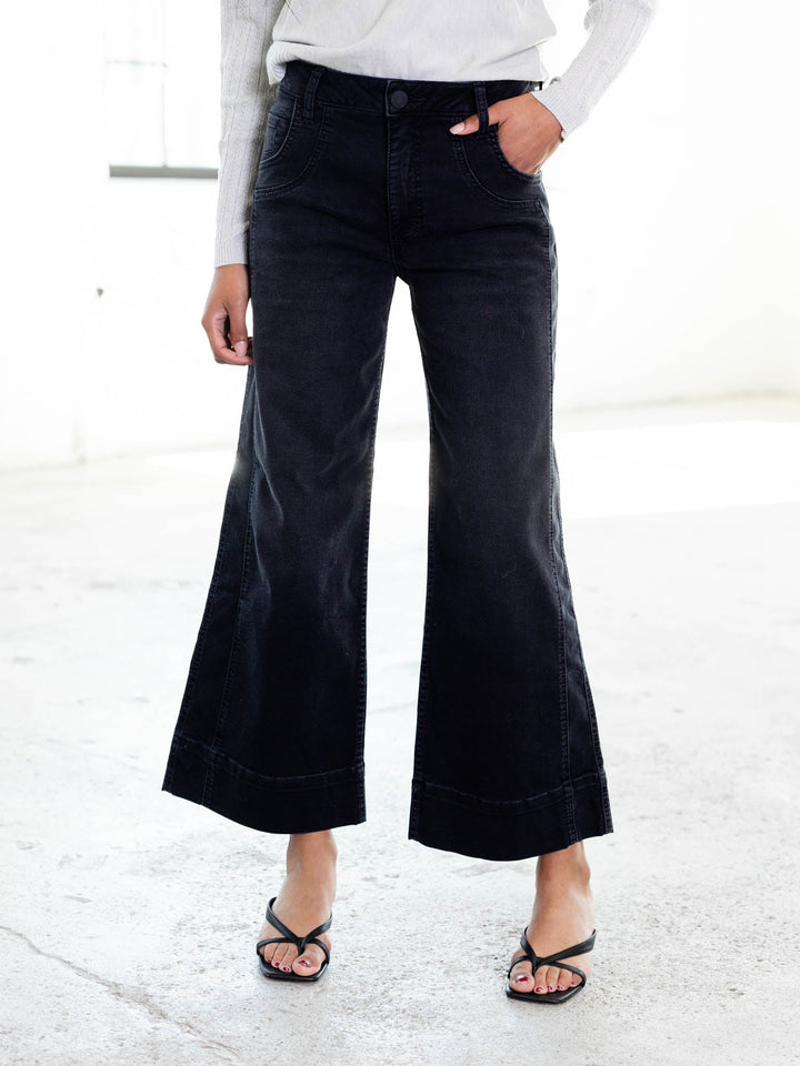 flared black denim jeans