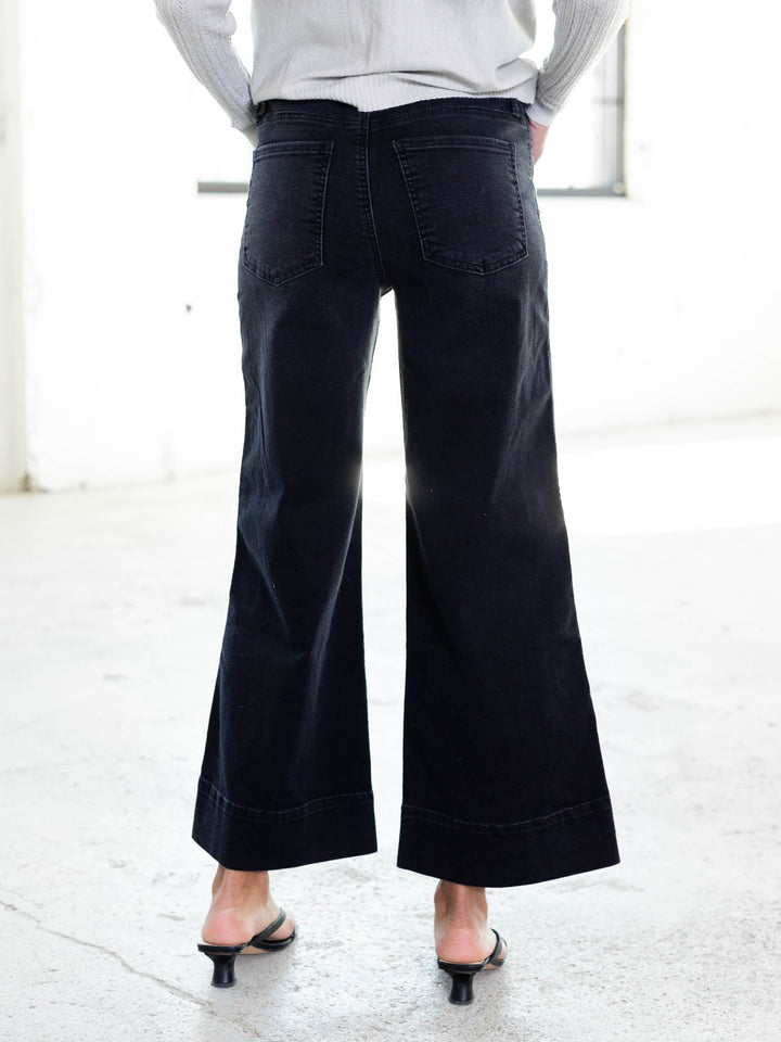 flared black denim jeans
