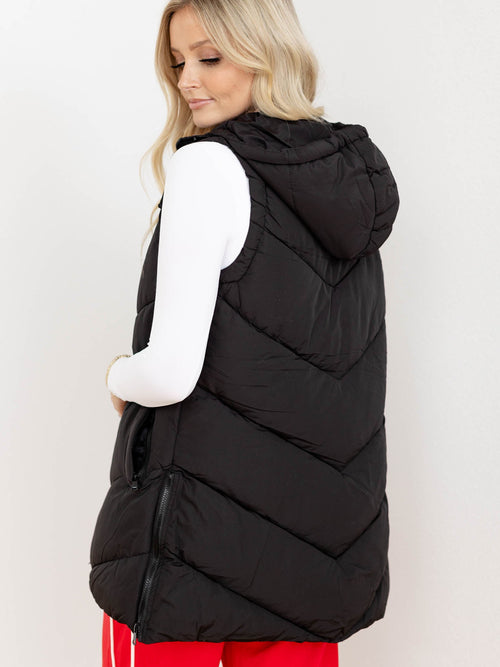 long puffy black vest