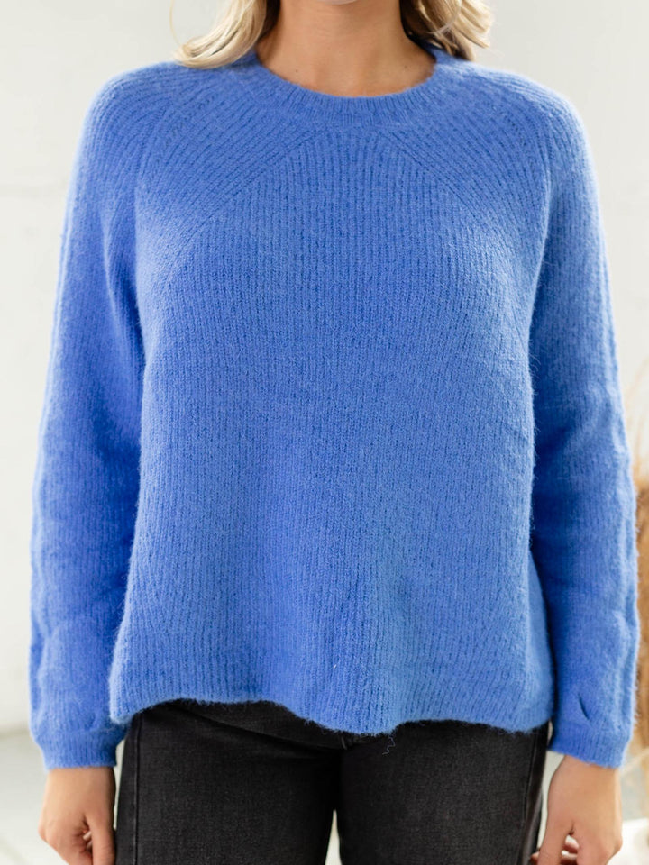 bright blue fuzzy crew neck sweater