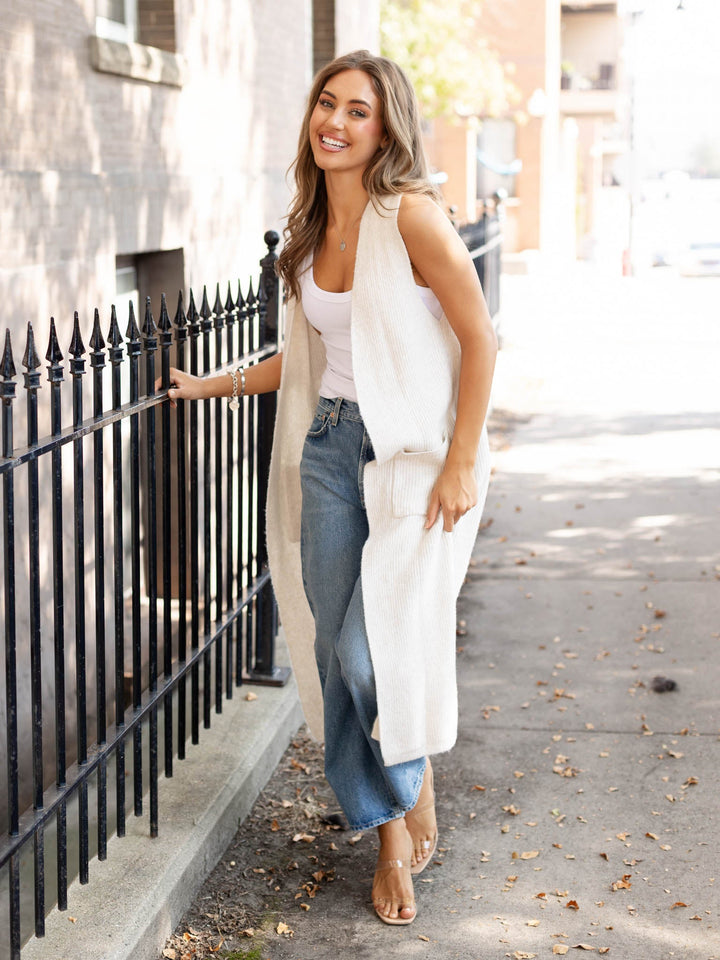 cream sleeveless long vest