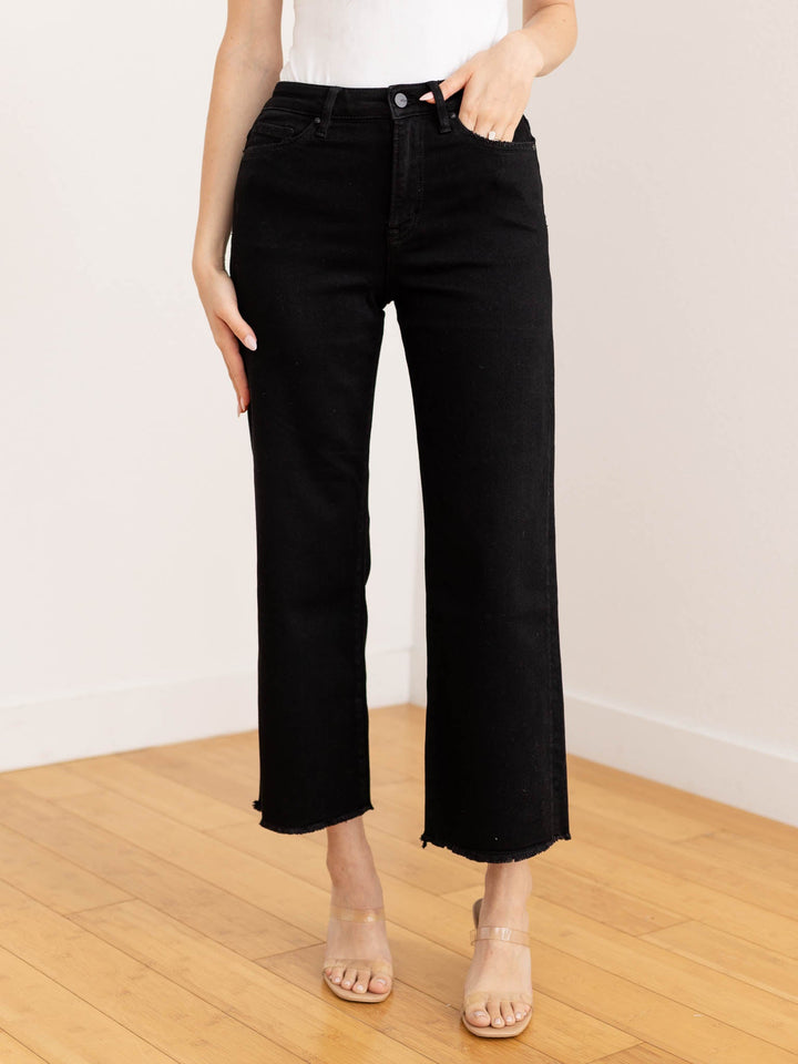 black frayed leg denim