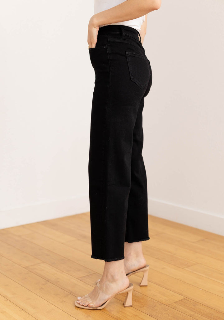 black frayed leg denim