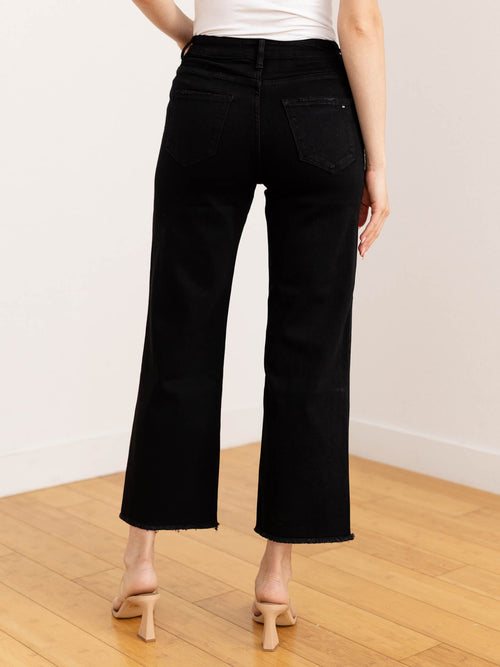 black frayed leg denim