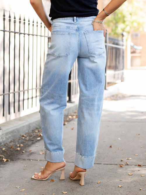 cuffed light wash barrel denim
