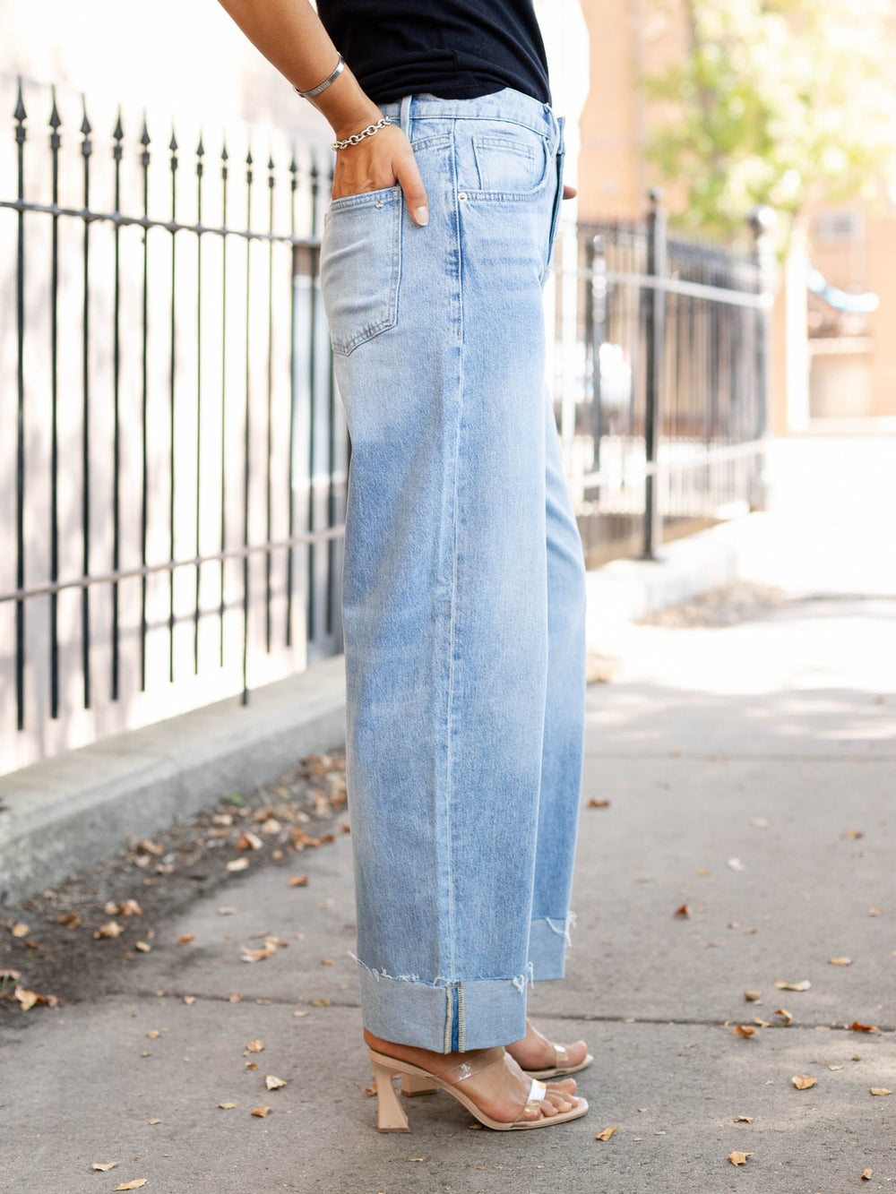 cuffed light wash barrel denim