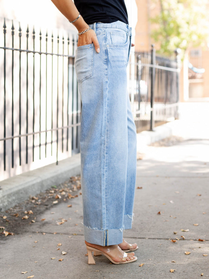 cuffed light wash barrel denim