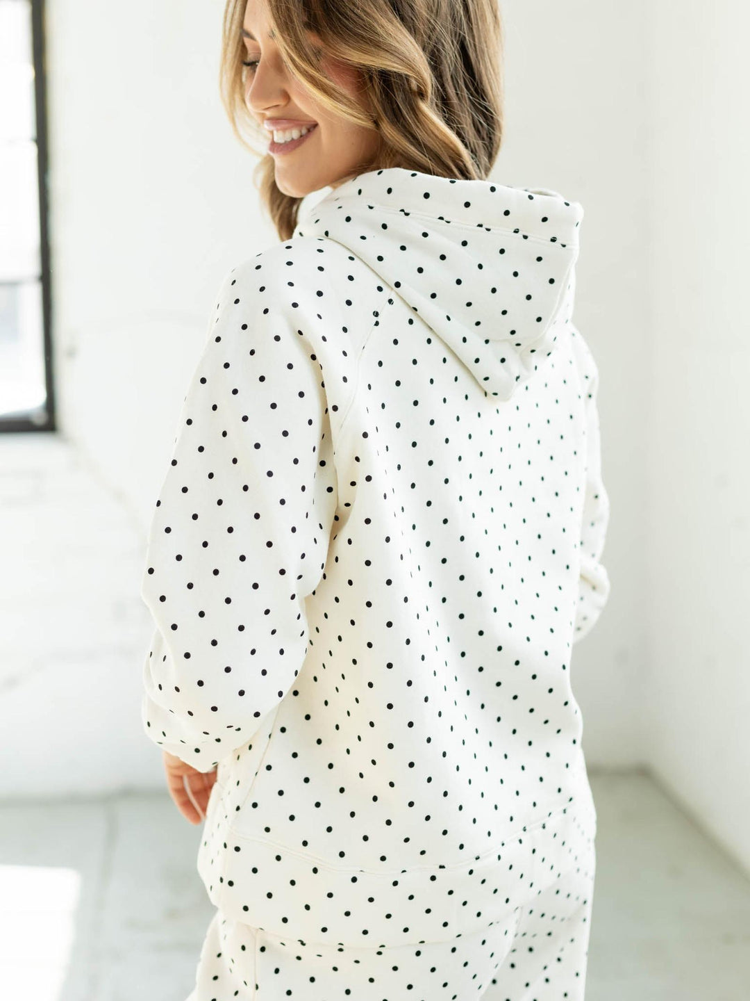 hooded polka dot sweatshirt