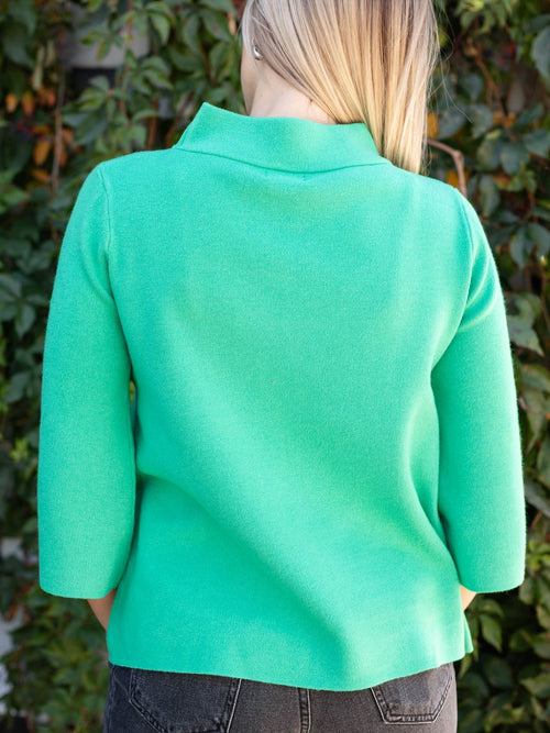green mock neck sweater