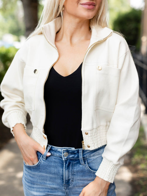 cream bomber jacket