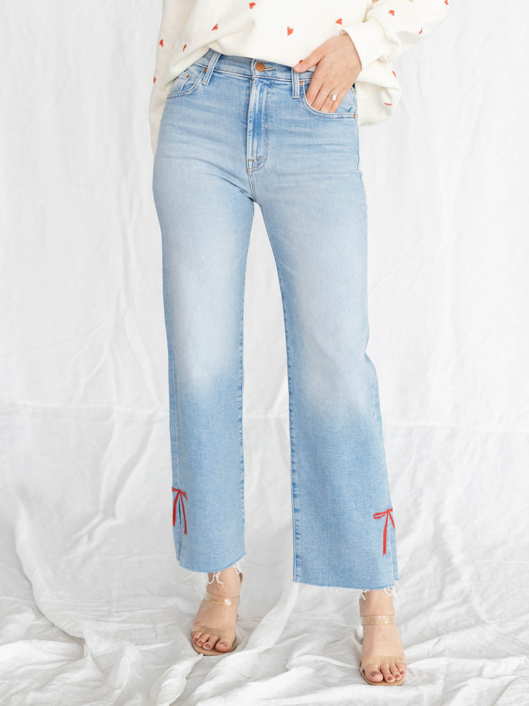 lightwash ankle denim with embroidered red bow