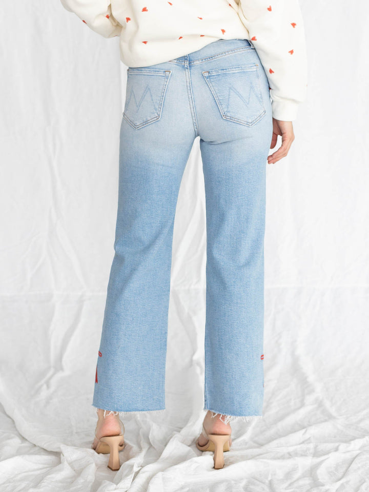 lightwash ankle denim with embroidered red bow