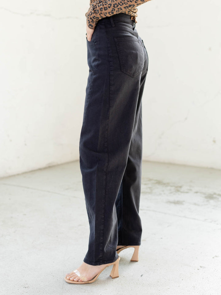 washed black barrel style denim