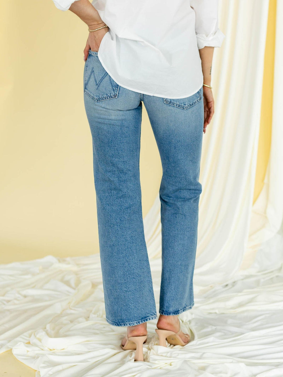curved seam bootcut medium wash denim