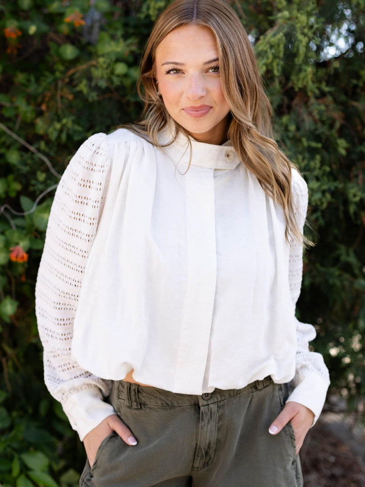 Mystree Off White Bubble Hem Jacket with crochet knit sleeves, button front, and gathered elastic hem.