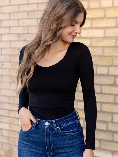 black fitted long sleeve top