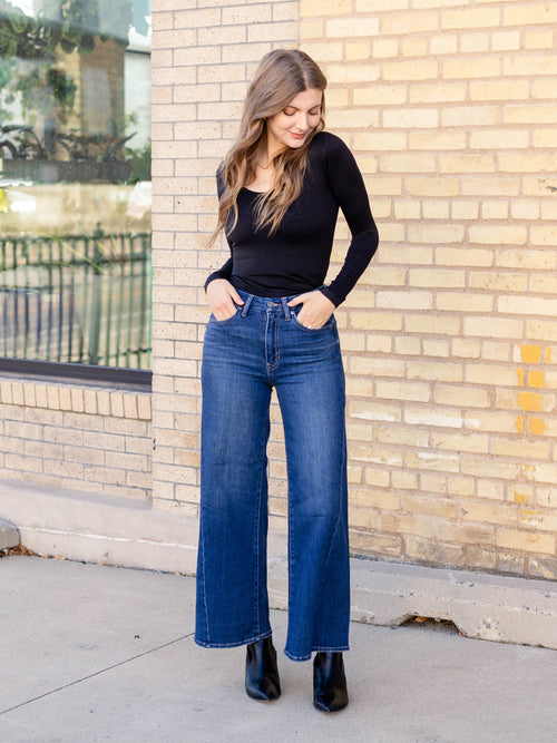 black fitted long sleeve top