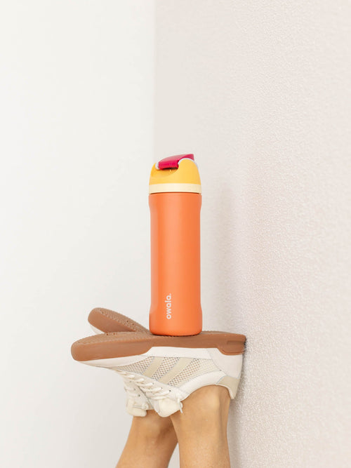 orange and yellow water bottle