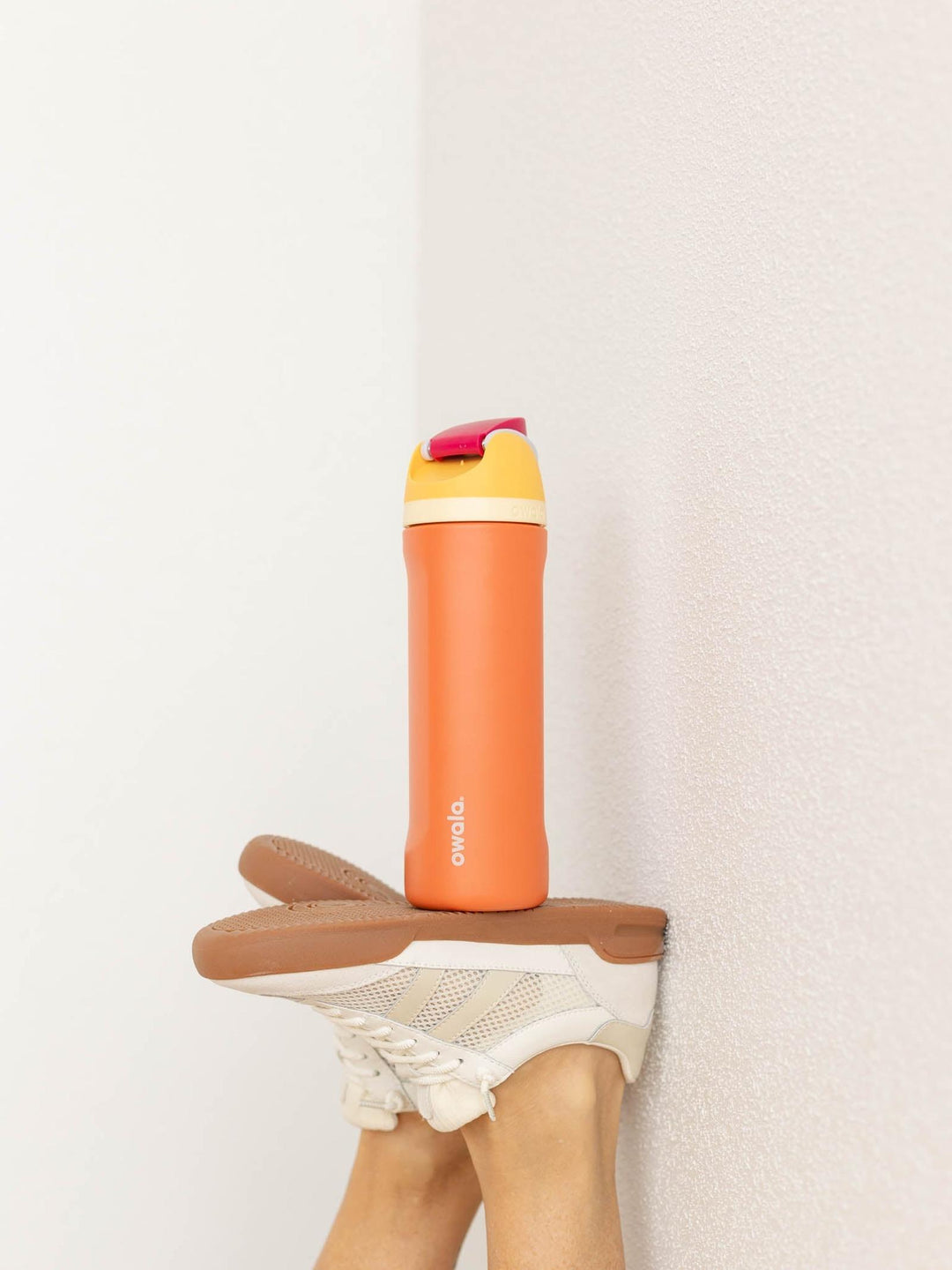 orange and yellow water bottle