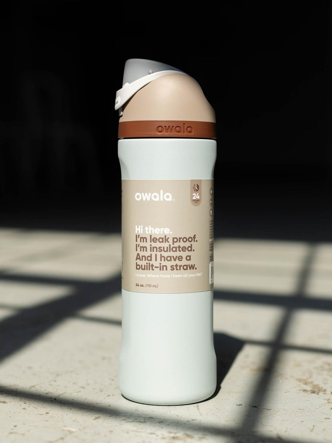 brown and blue owala water bottle